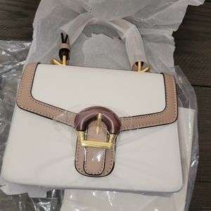 New leather purse w gold and leather buckle and storage bag approx 5x8